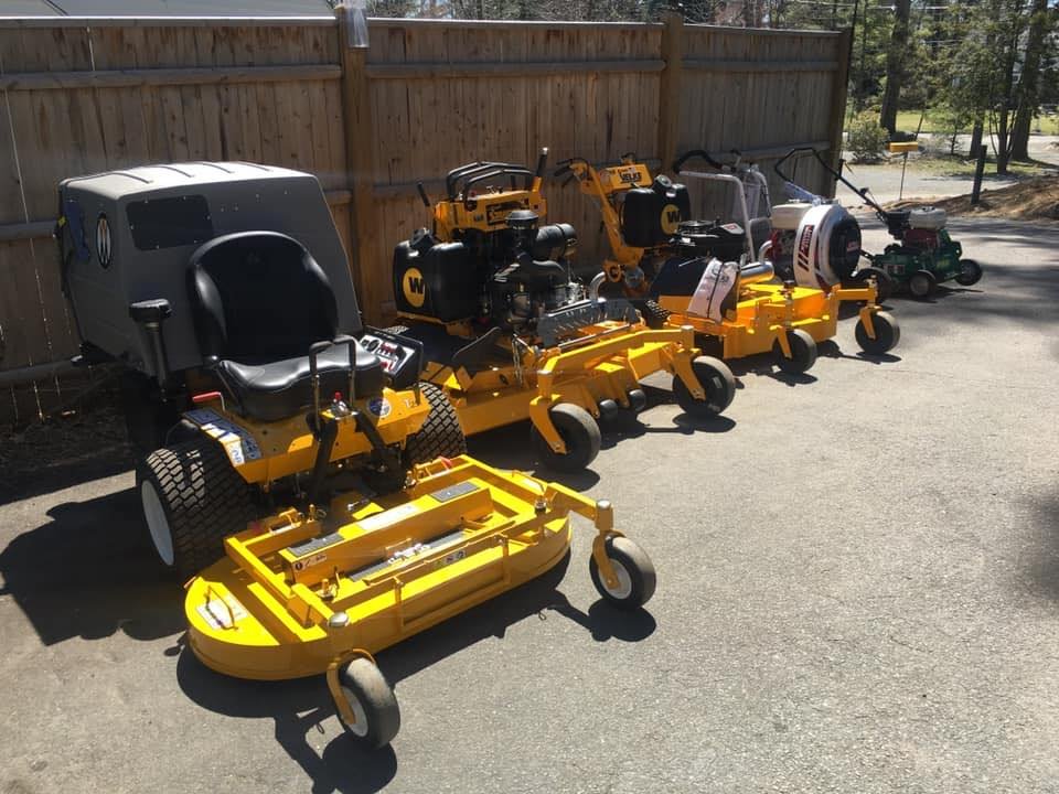 Walker and Wright commercial mowers lined up on the lot at Lummus Inc. in Lynnfield, Massachusetts
